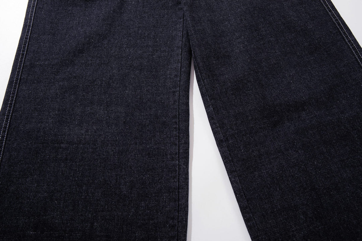 Madxmarx Asymmetric Button Wide-Leg Jeans