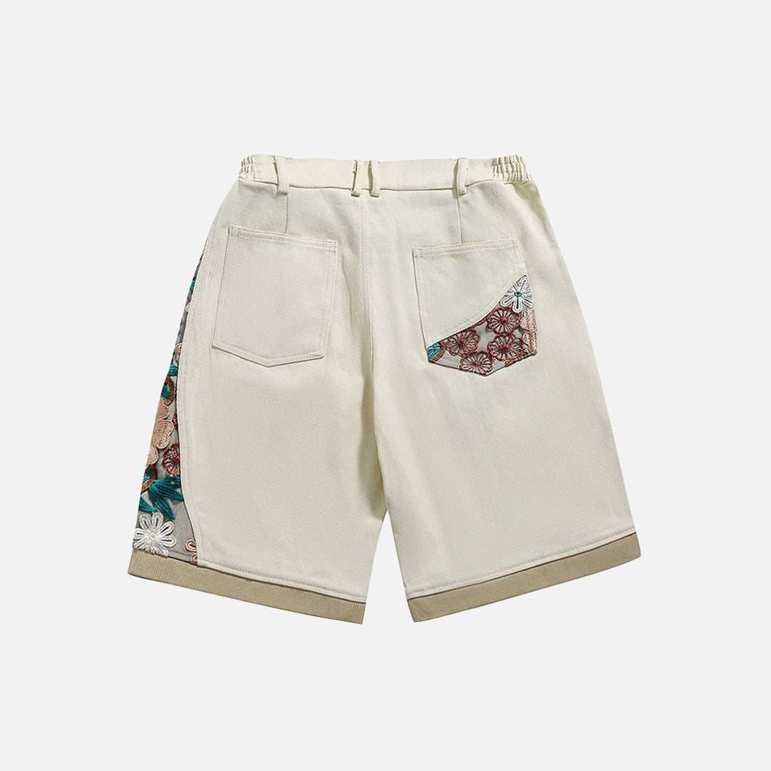 Pantaloncini di jeans con patchwork floreale