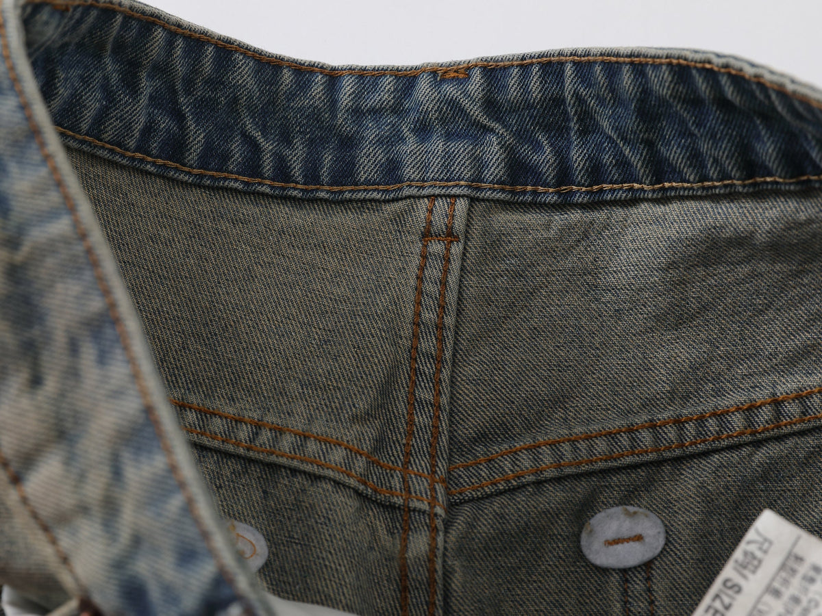Pantalon en jean incurvé effet vieilli Madxmarx