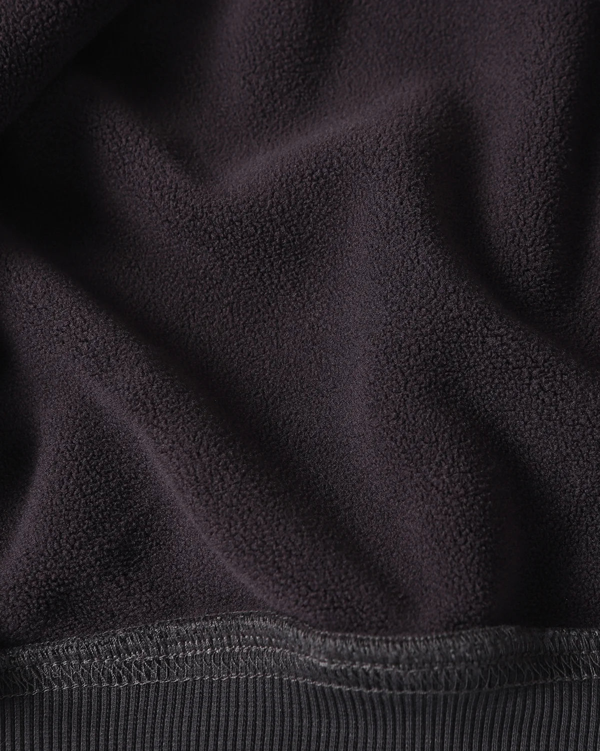 Sudadera lavada con cremallera asimétrica