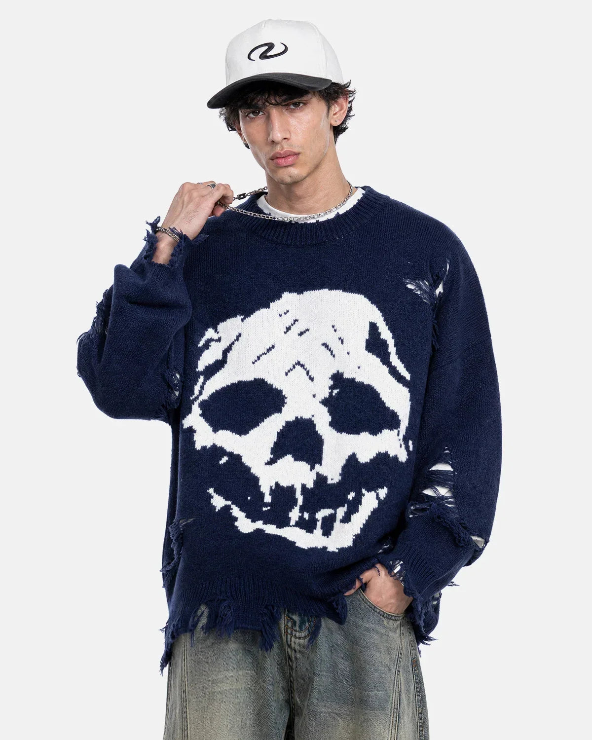 Suéter de punto con calavera desgastada