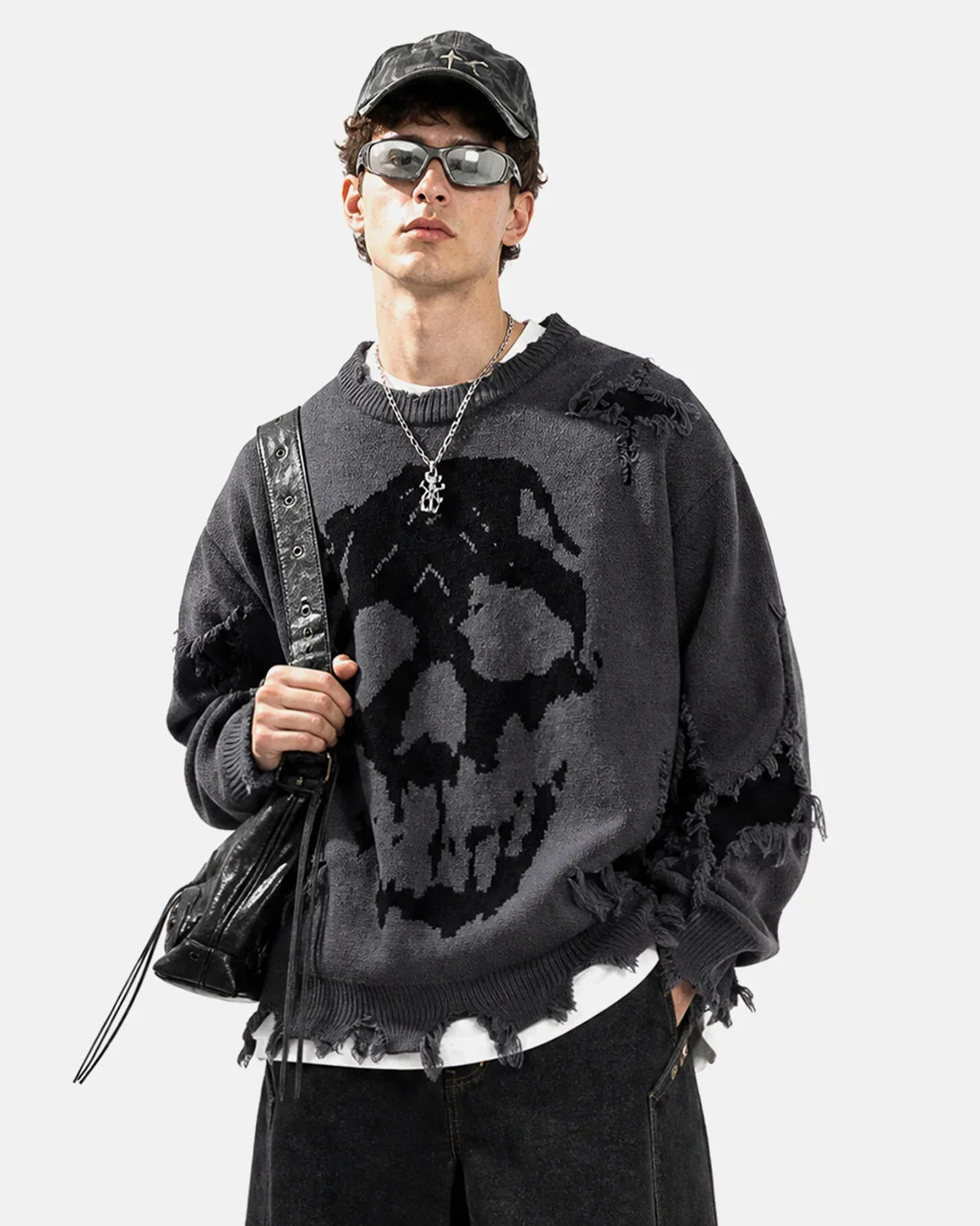 Suéter de punto con calavera desgastada