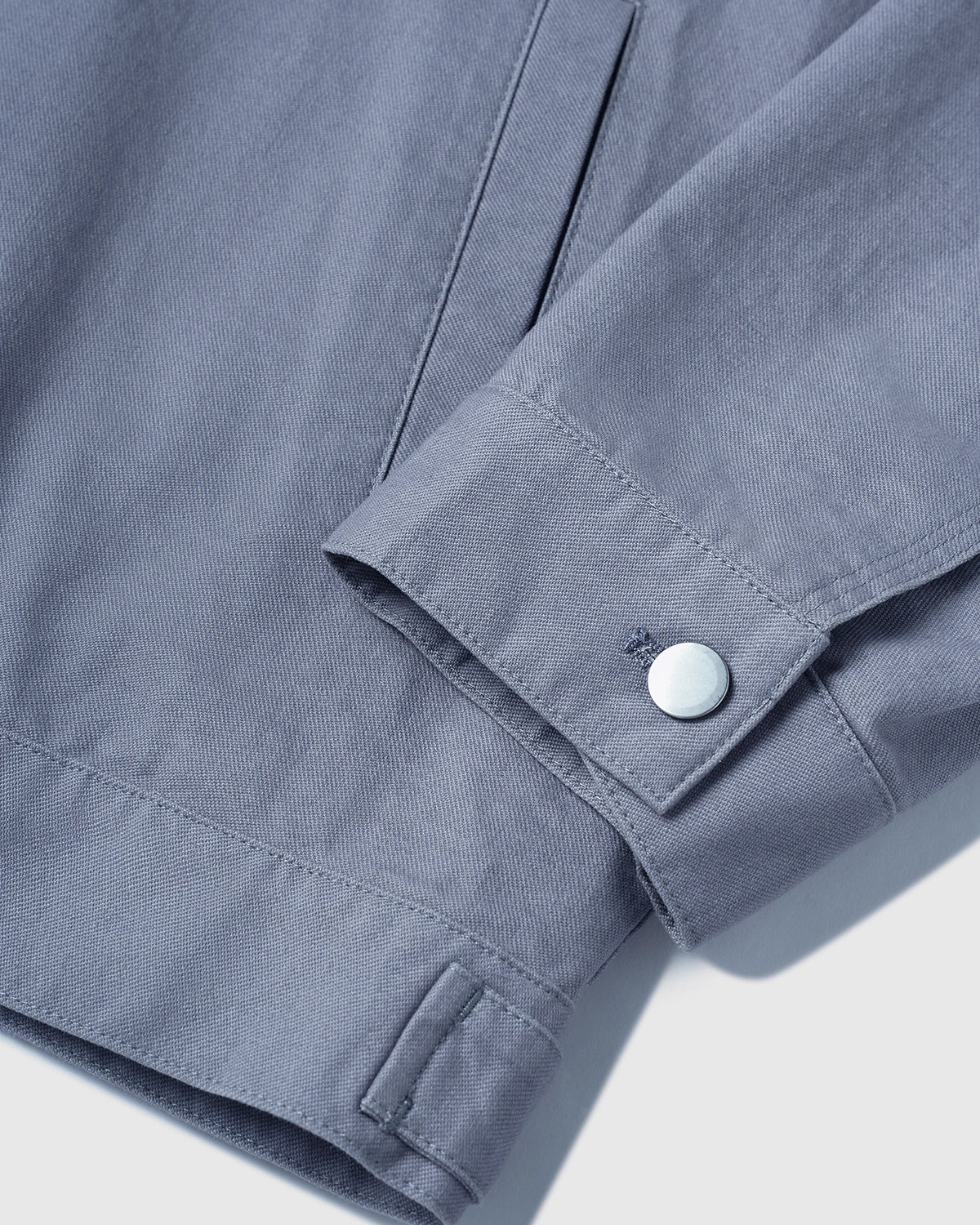 Veste de travail à poche asymétrique