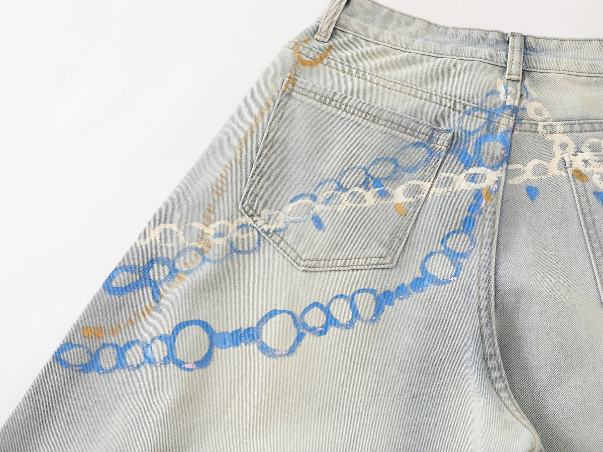 Madxmarx Handbemalte weite Jeans mit Grafik-Print