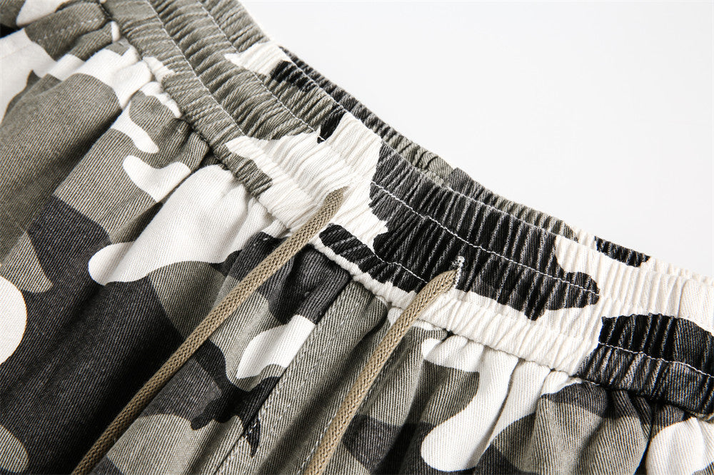 Pantaloncini mimetici effetto usurato
