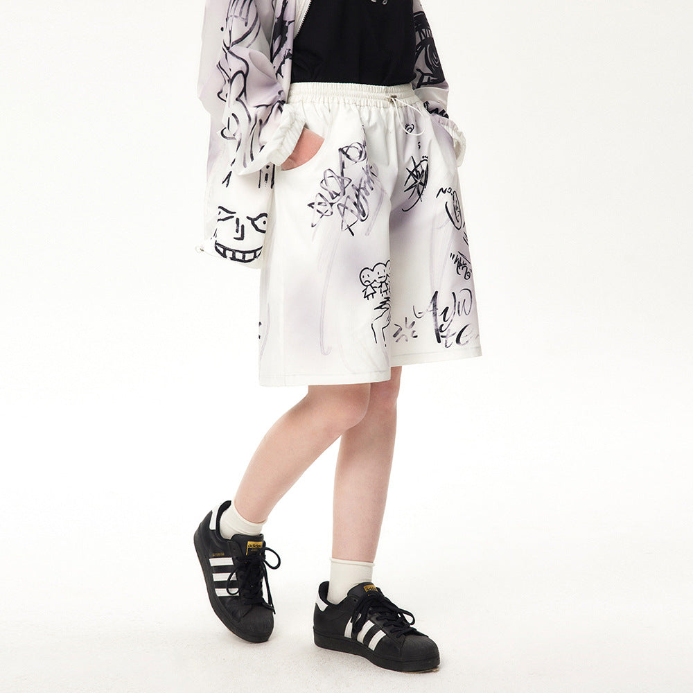 High street graffiti spray dye shorts