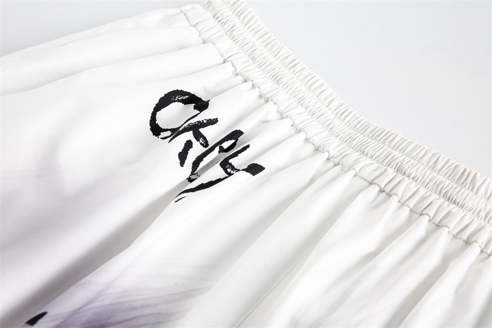 High street graffiti spray dye shorts