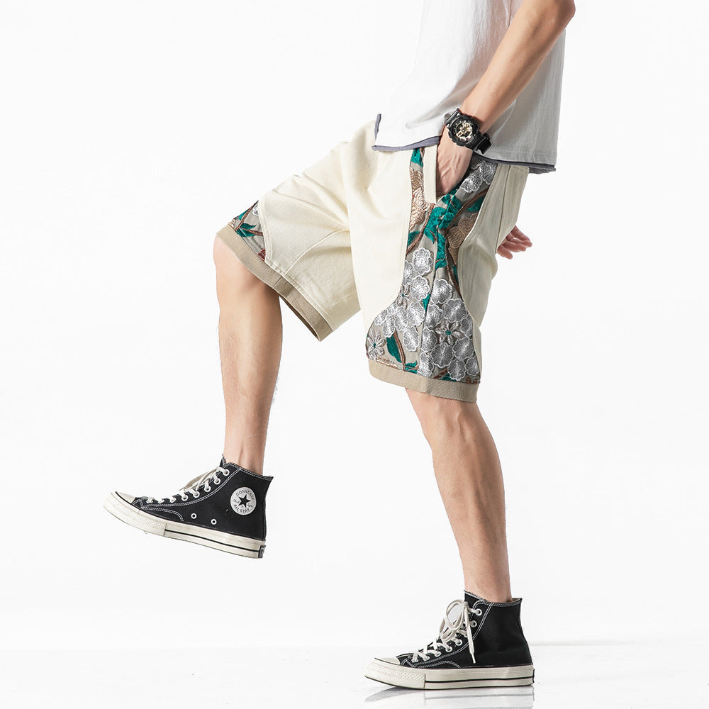 Geborduurde sportshorts met kant en stiksels