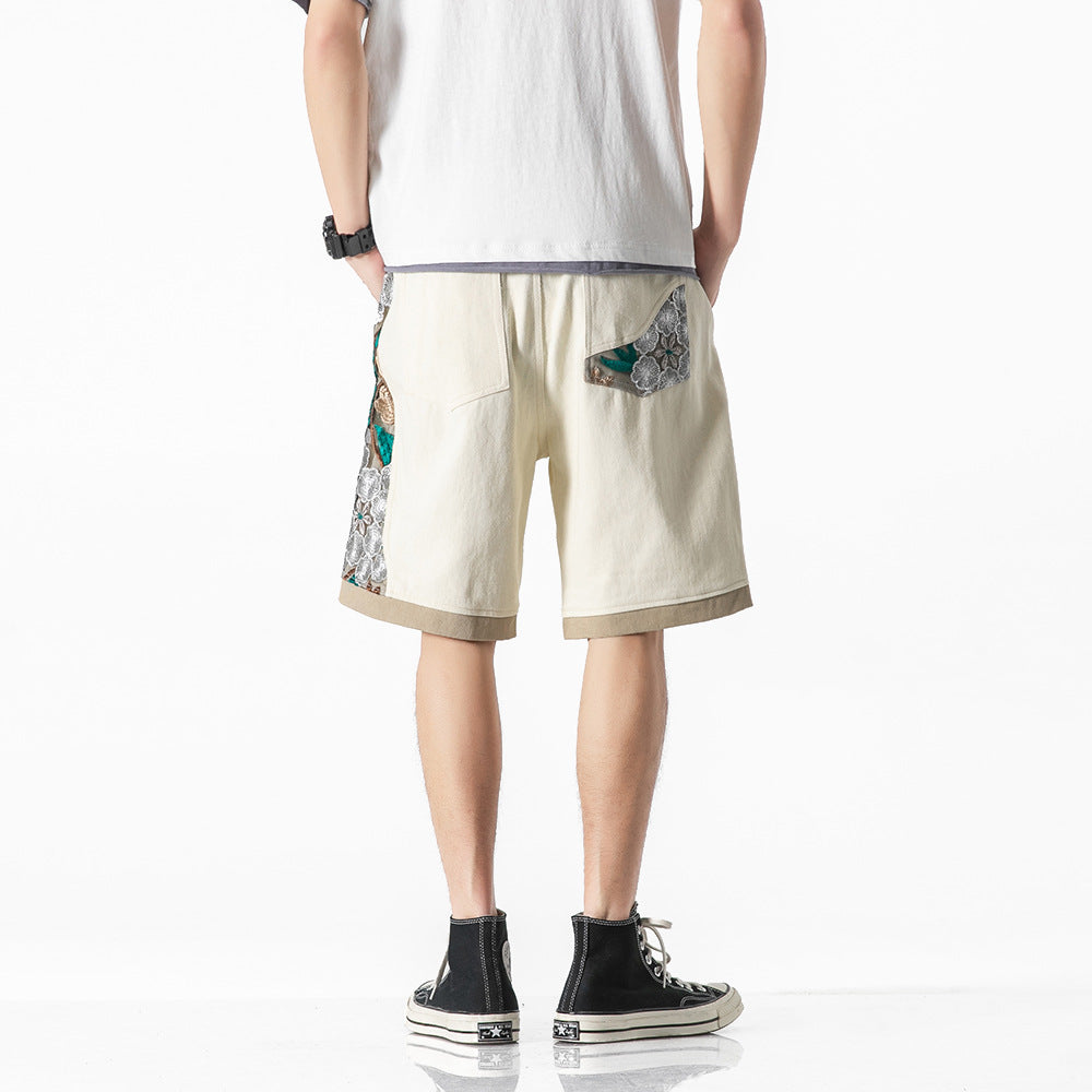 Geborduurde sportshorts met kant en stiksels