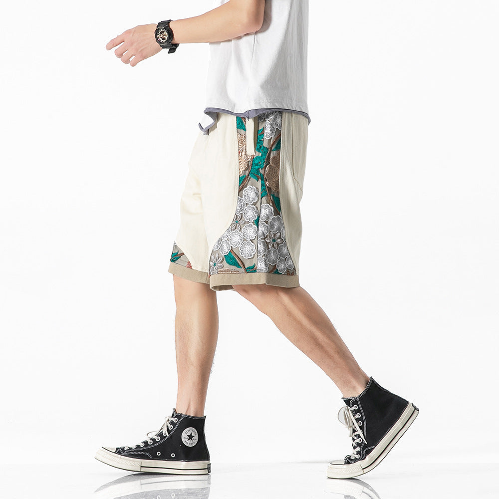 Geborduurde sportshorts met kant en stiksels