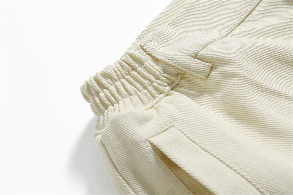 Geborduurde sportshorts met kant en stiksels