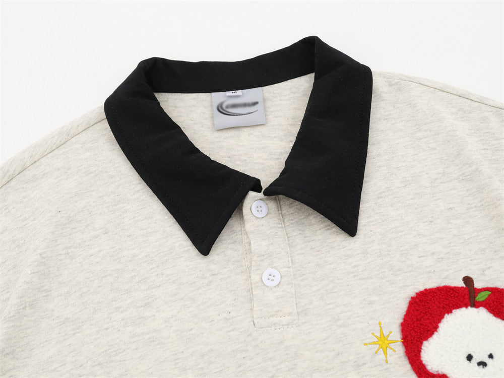 Poloshirt mit Cartoon-Stickerei – lockere Passform