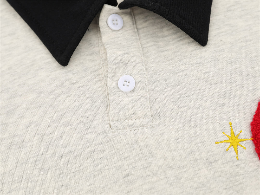 Poloshirt mit Cartoon-Stickerei – lockere Passform