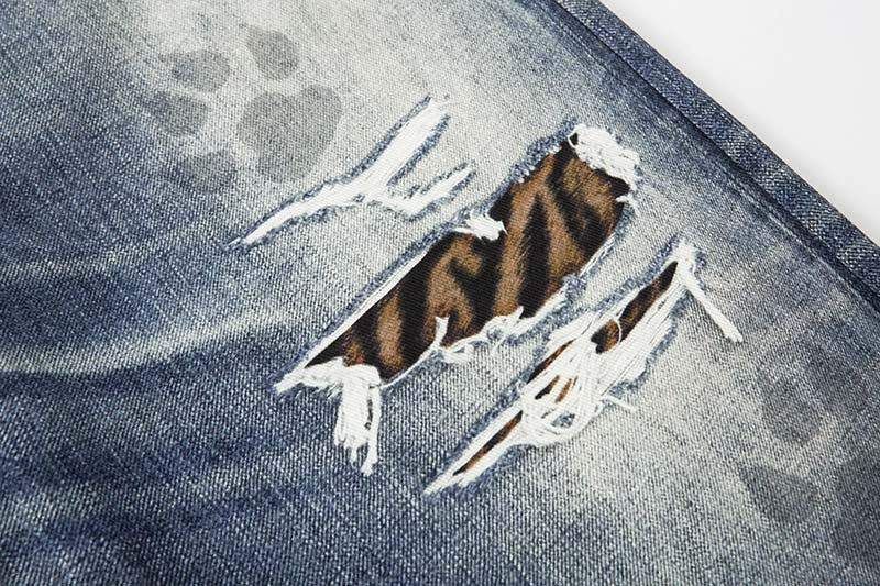 DAXUEN Distressed wide-leg jeans with tiger stripe pattern