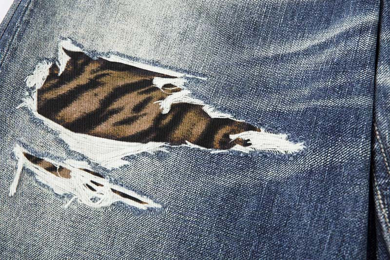 DAXUEN Distressed wide-leg jeans with tiger stripe pattern