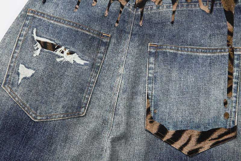 DAXUEN Distressed wide-leg jeans with tiger stripe pattern