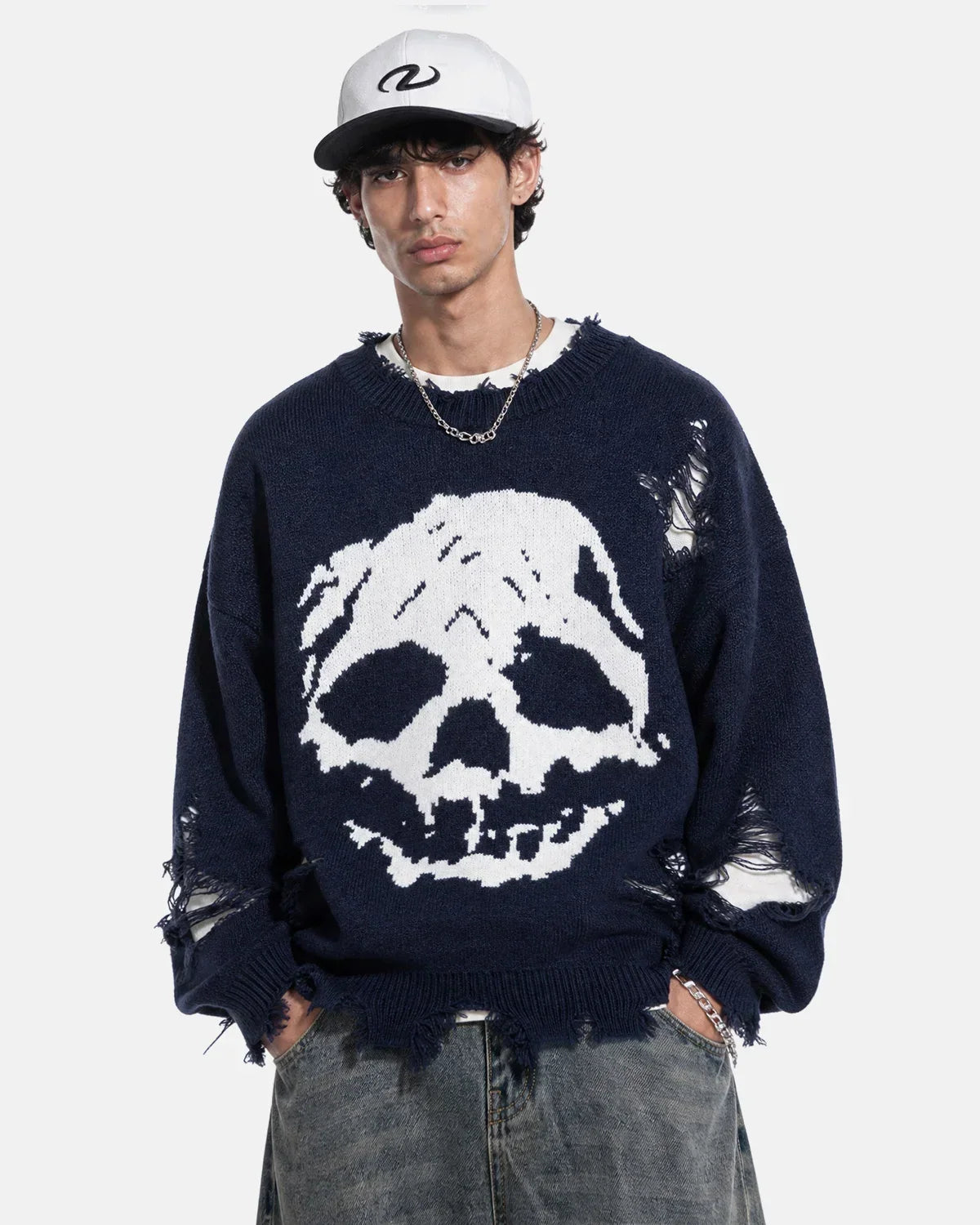 Suéter de punto con calavera desgastada
