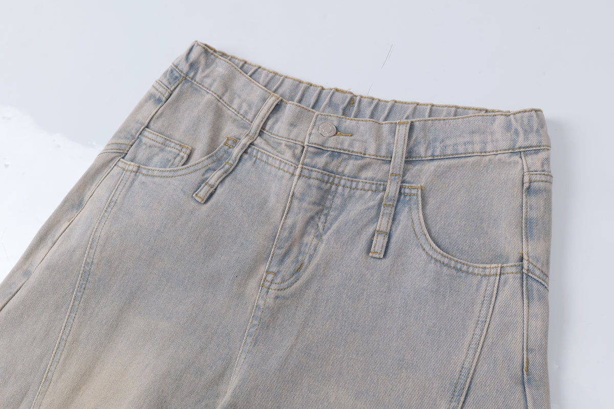 Madxmarx Distressed Curved Wide-Leg Denim Pants