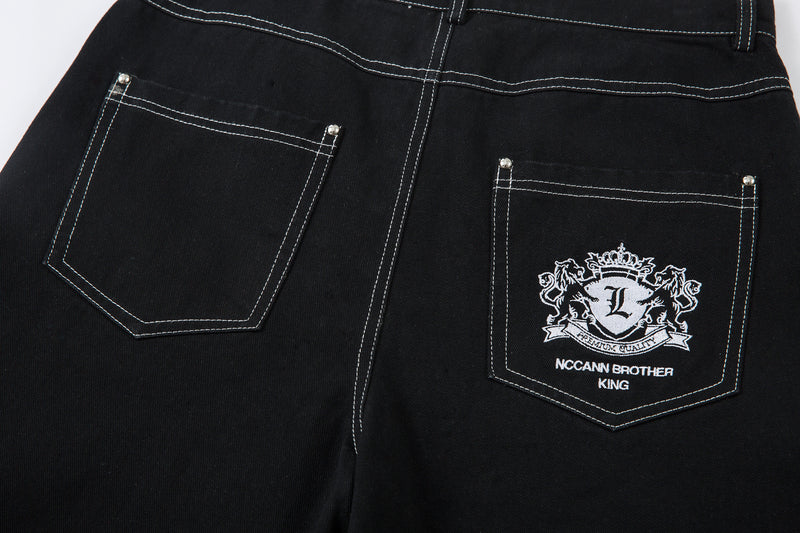Madxmarx Embroidered Crest Wide-Leg Jeans