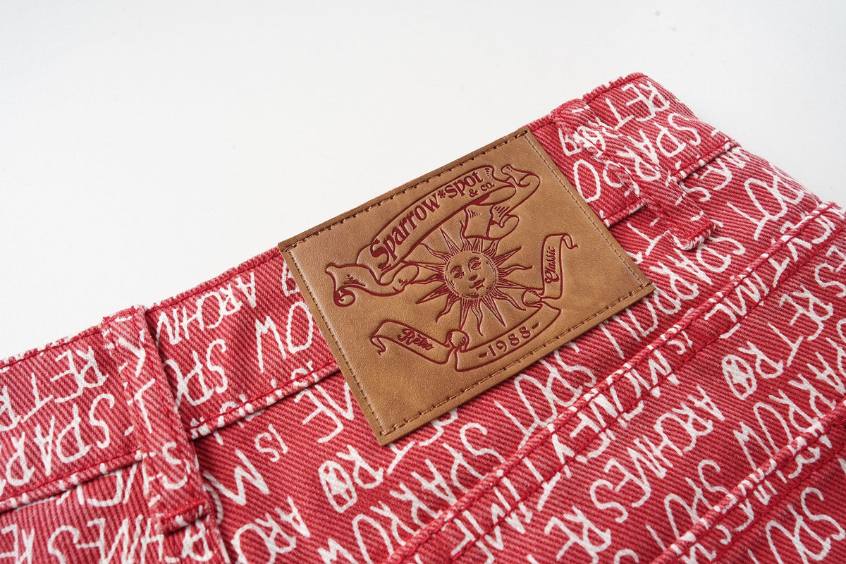 Madxmarx Hose mit Allover-Schriftprint und weitem Bein