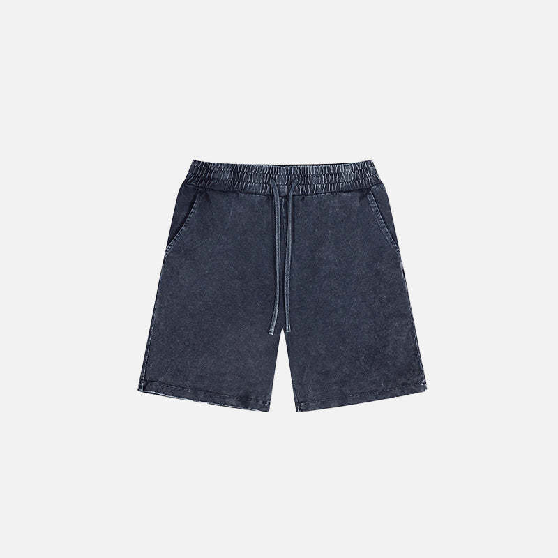 Pantaloncini in denim vintage lavati e usurati
