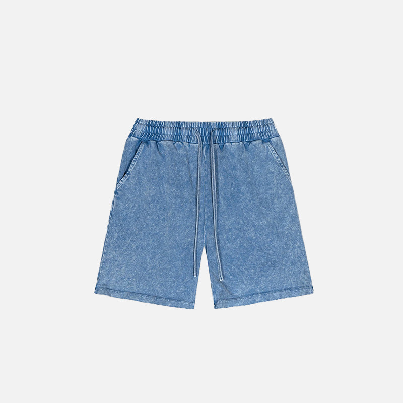Pantaloncini in denim vintage lavati e usurati