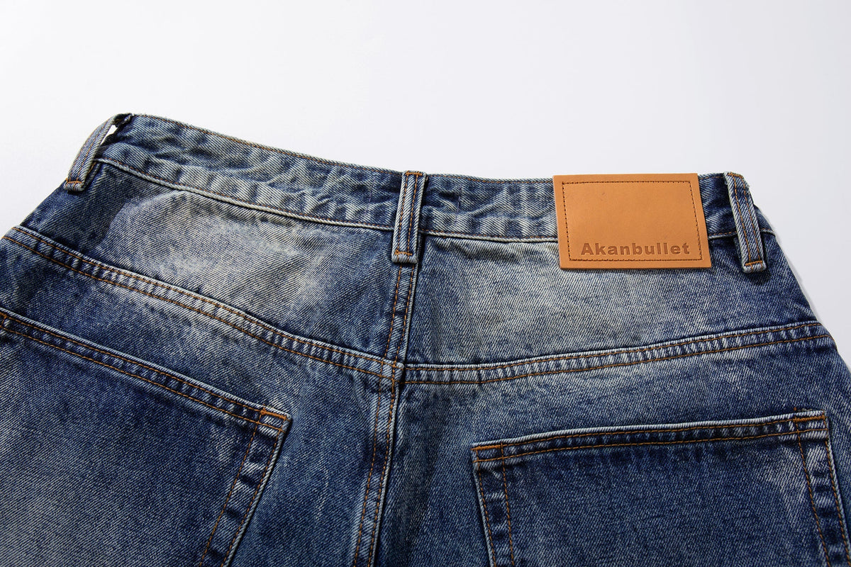 Jean large délavé à effet usé Madxmarx