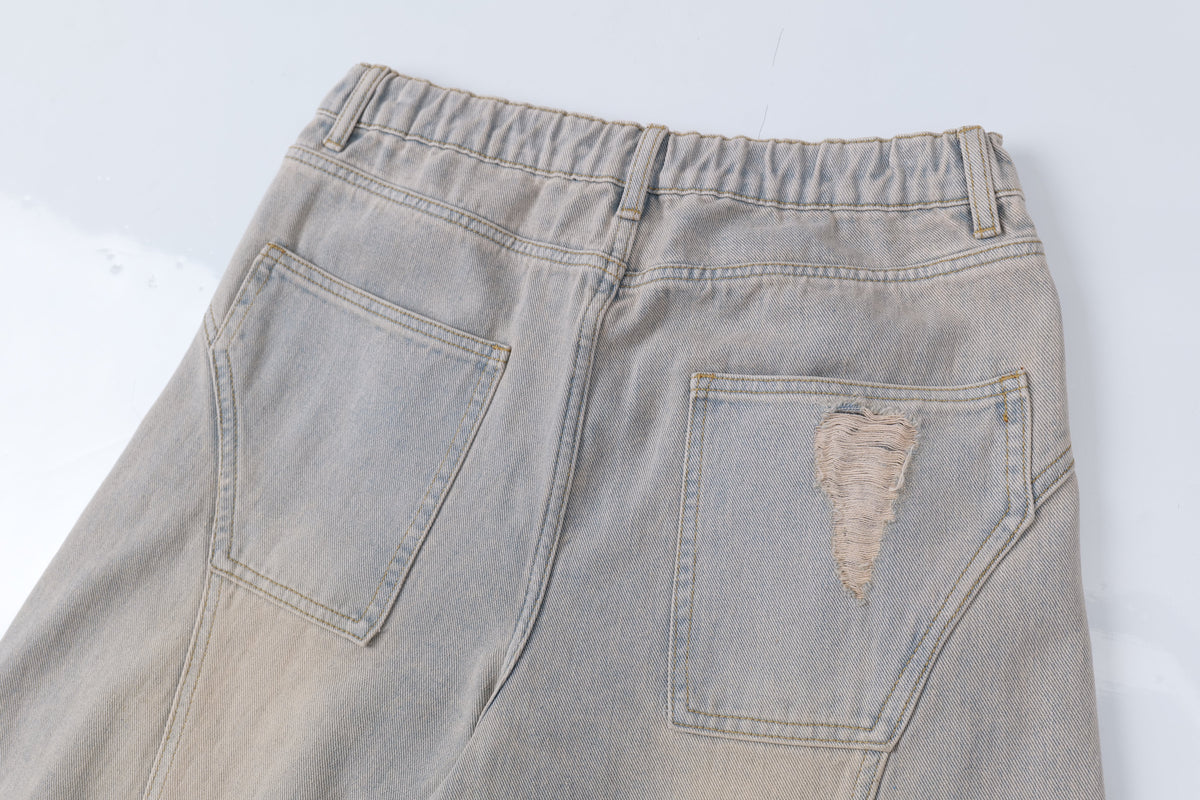 Madxmarx Distressed Curved Wide-Leg Denim Pants
