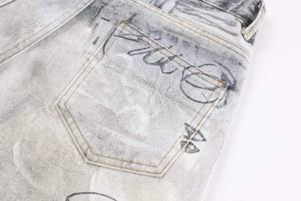 Pantalon en jean délavé à coupe incurvée Madxmarx Graffiti