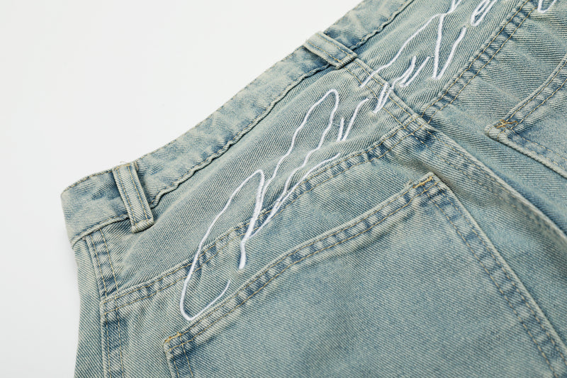 Pantalones de mezclilla Madxmarx de corte curvo