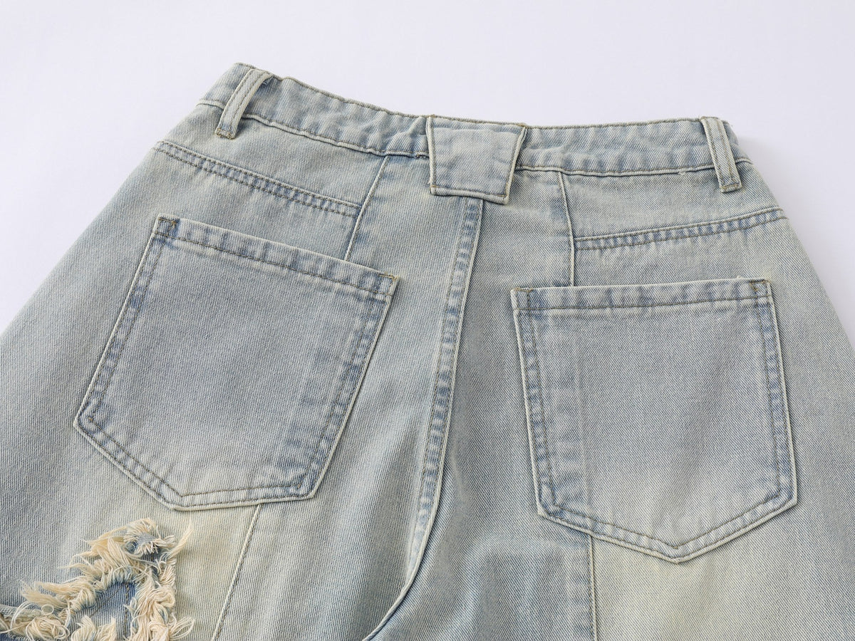 Jeans de pierna ancha con efecto desgastado y estrellas de Madxmarx