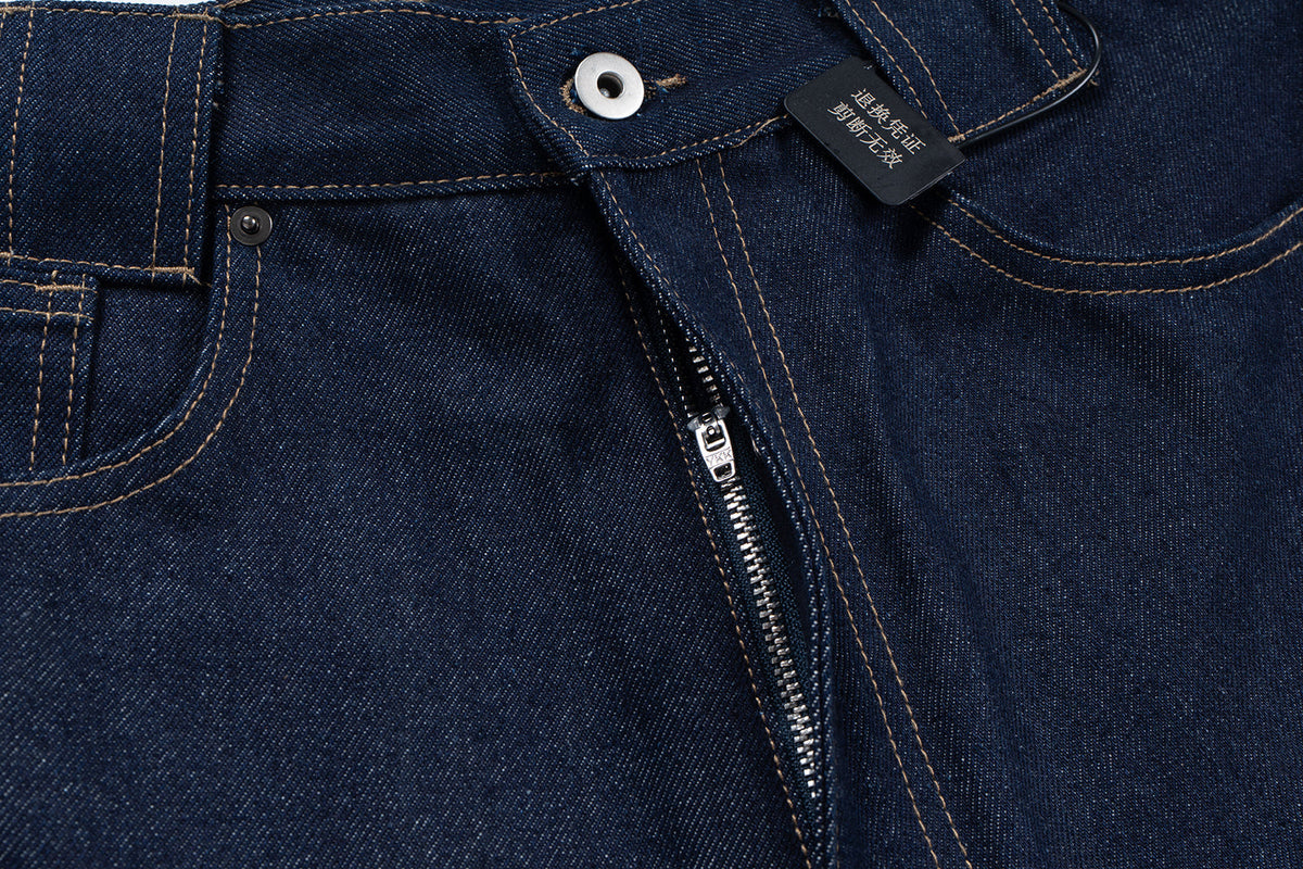 Madxmarx Curved-Cut Raw Denim Jeans