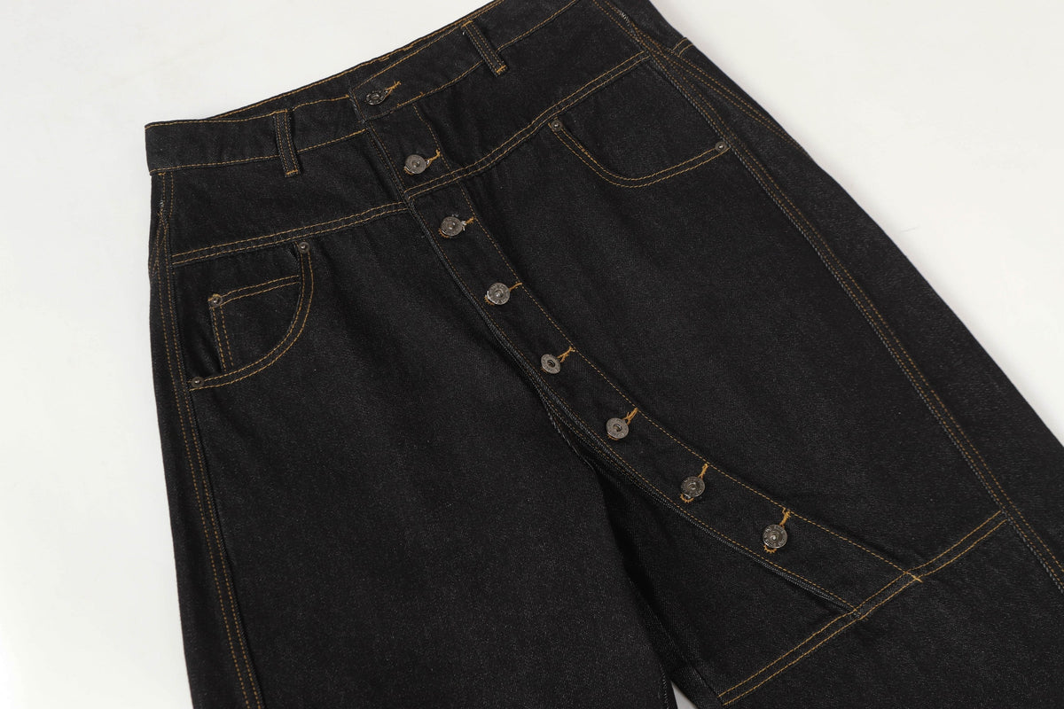 Pantalon large en jean à boutons asymétriques Madxmarx