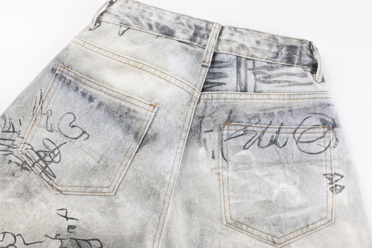 Pantalon en jean délavé à coupe incurvée Madxmarx Graffiti