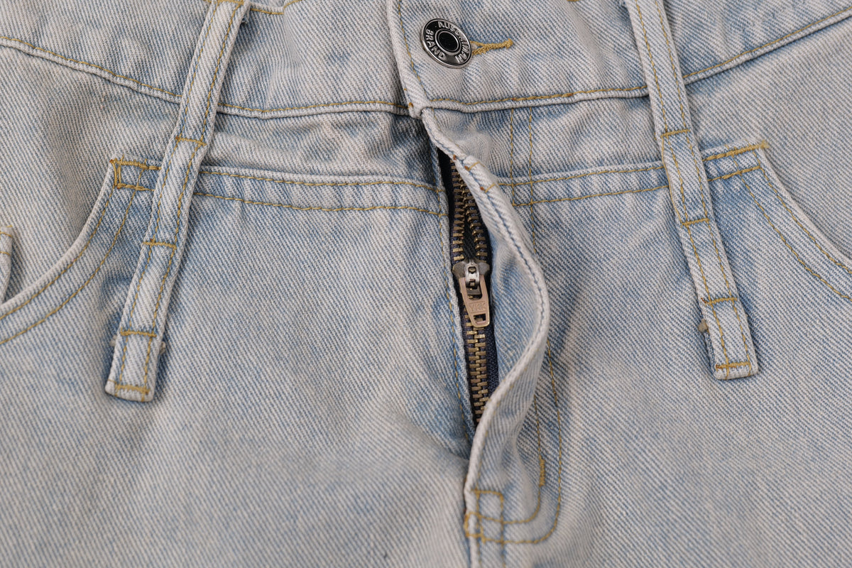 Madxmarx Distressed Curved Wide-Leg Denim Pants