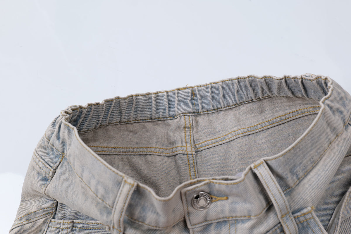 Madxmarx Distressed Curved Wide-Leg Denim Pants