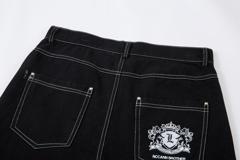 Madxmarx Embroidered Crest Wide-Leg Jeans