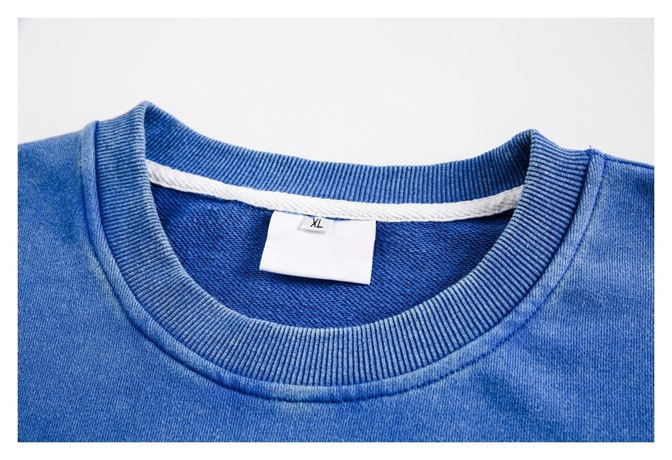 Sudadera holgada de cuello redondo