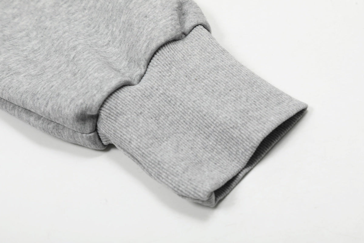 Madxmarx Kurzer Kapuzenpullover mit Perlenbesatz
