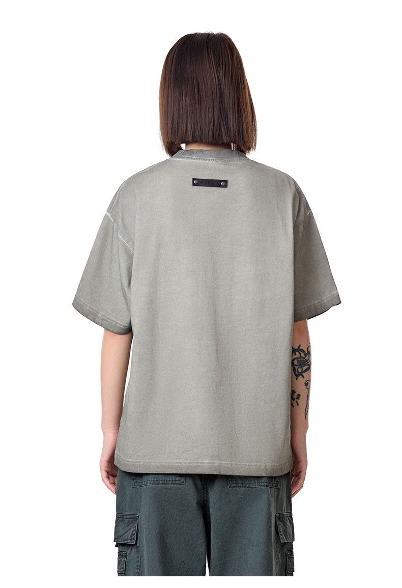 Camiseta vintage lavada “SKINT” de Madxmarx