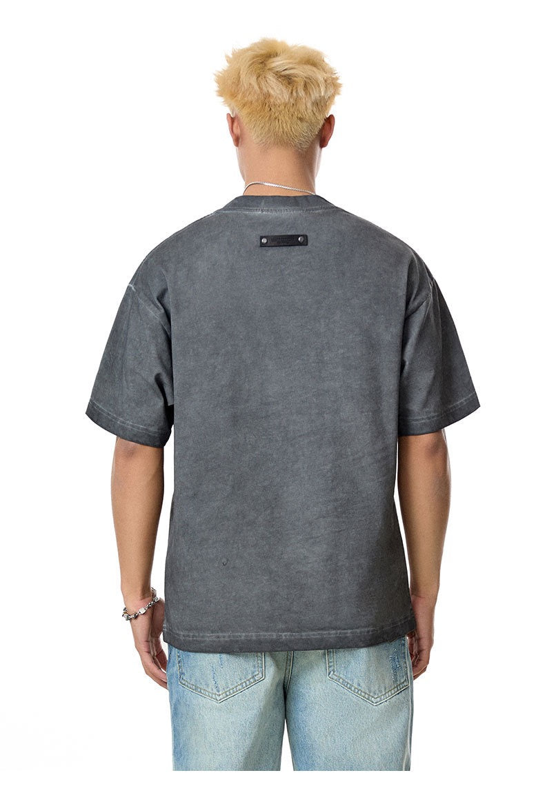 Camiseta vintage lavada “SKINT” de Madxmarx