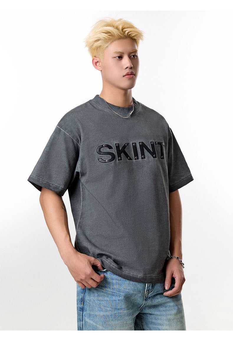 Camiseta vintage lavada “SKINT” de Madxmarx