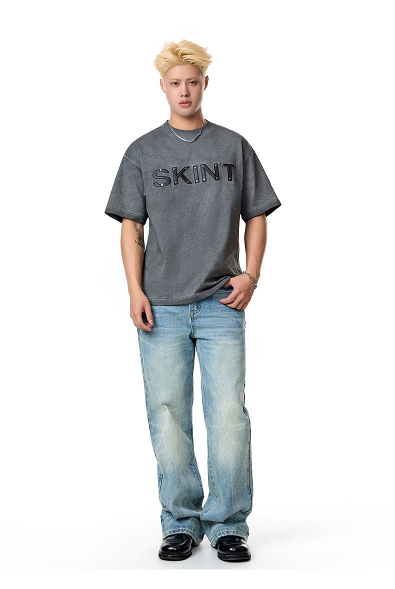 Camiseta vintage lavada “SKINT” de Madxmarx