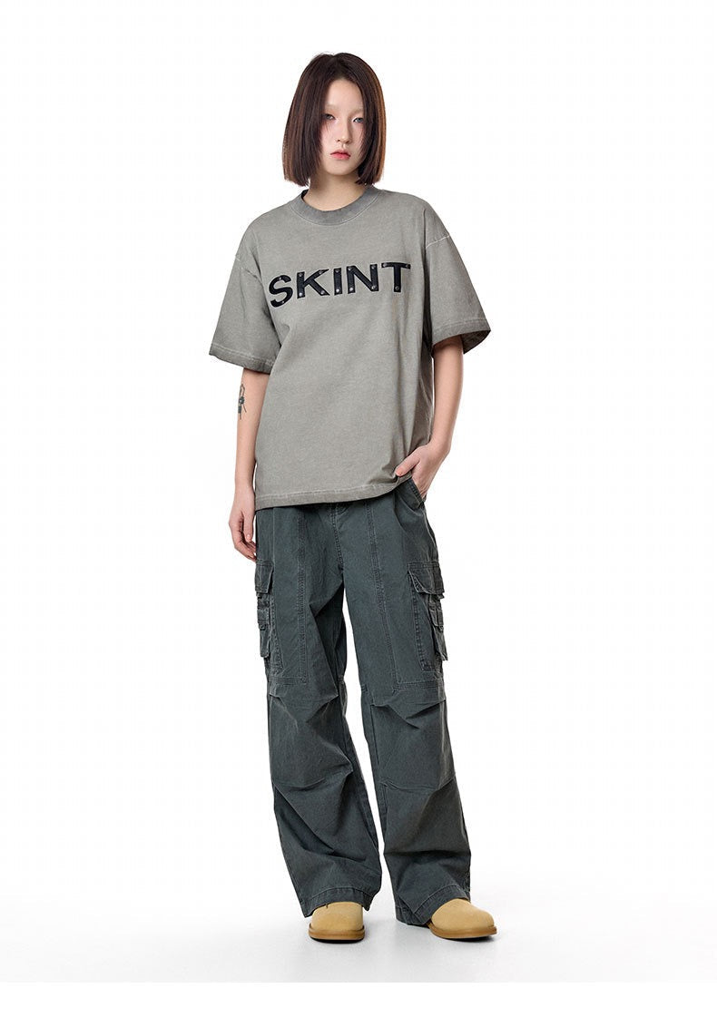 Camiseta vintage lavada “SKINT” de Madxmarx