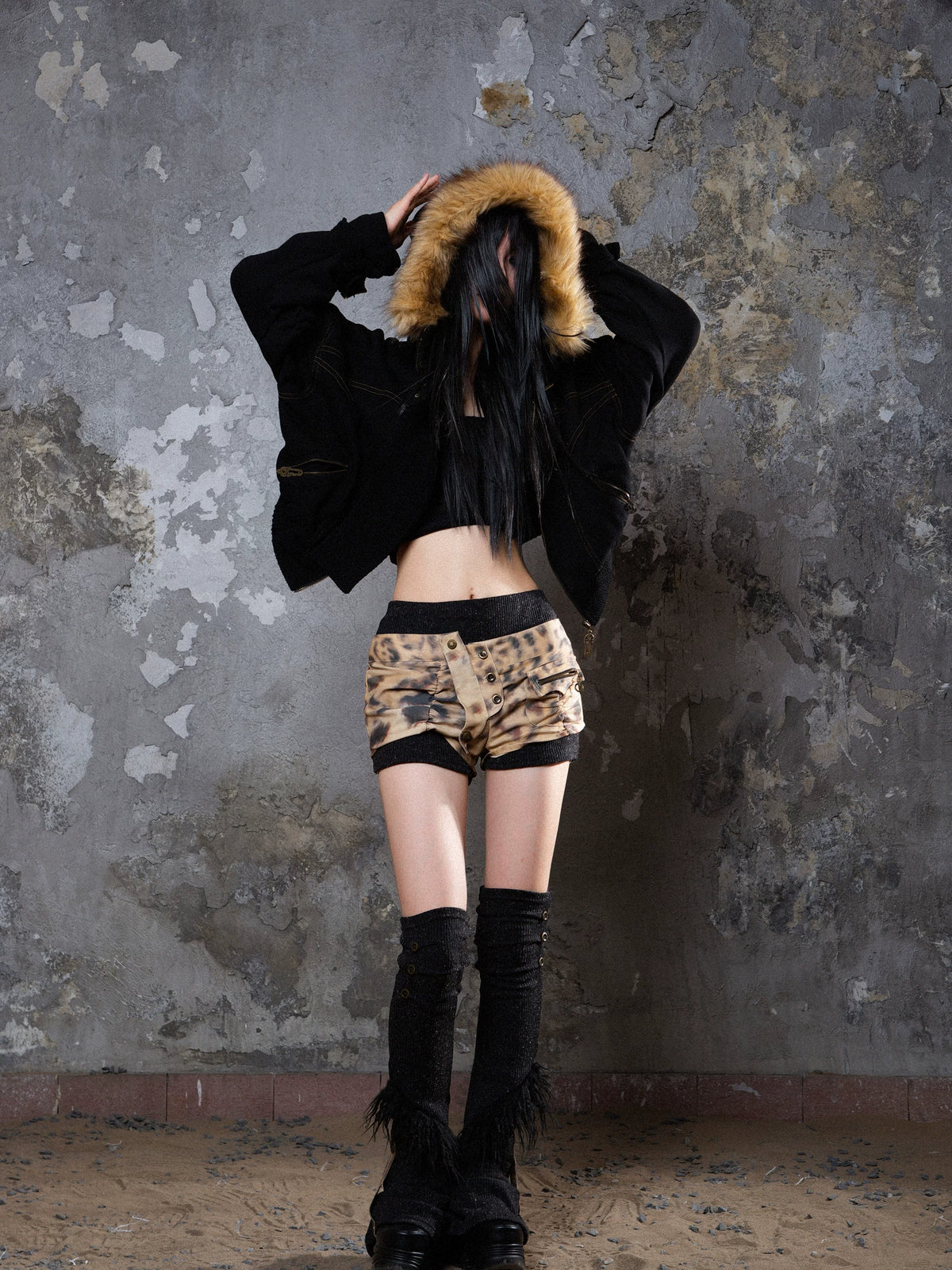 Shorts contrastants taille basse effet superposé et jambières en maille