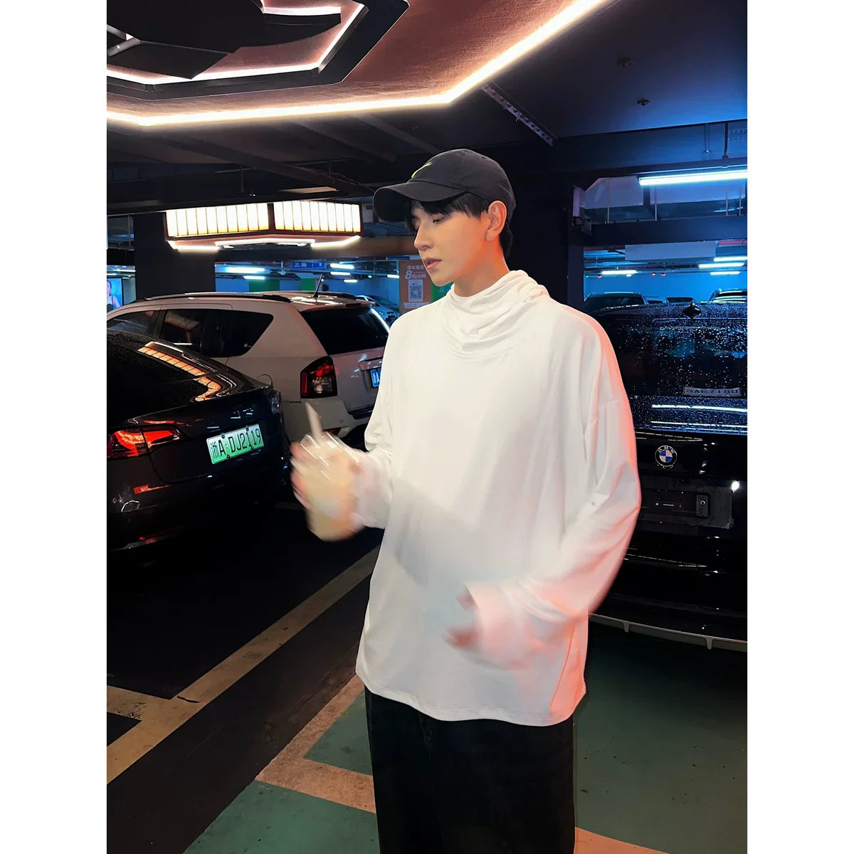 T-shirt met lange mouwen en capuchon en duimgat