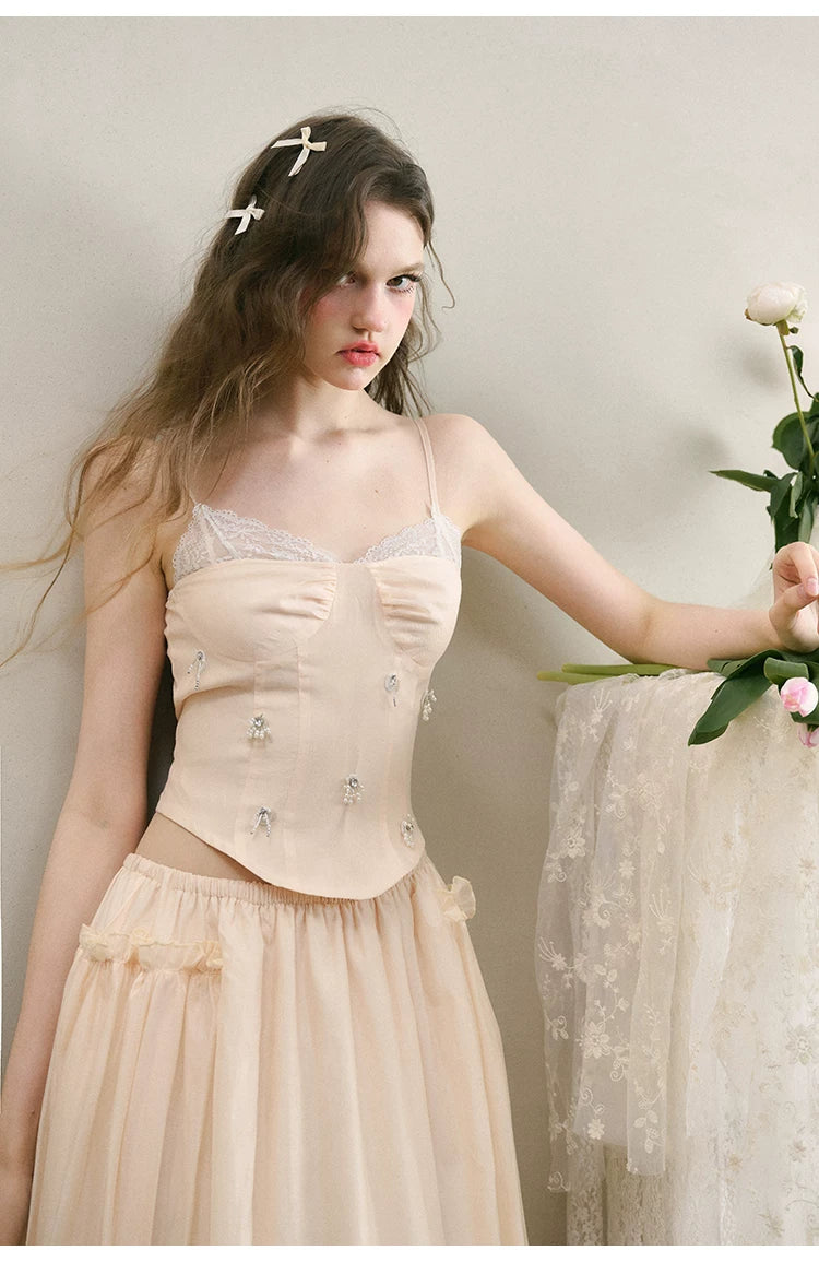 Ensemble caraco en dentelle et jupe longue