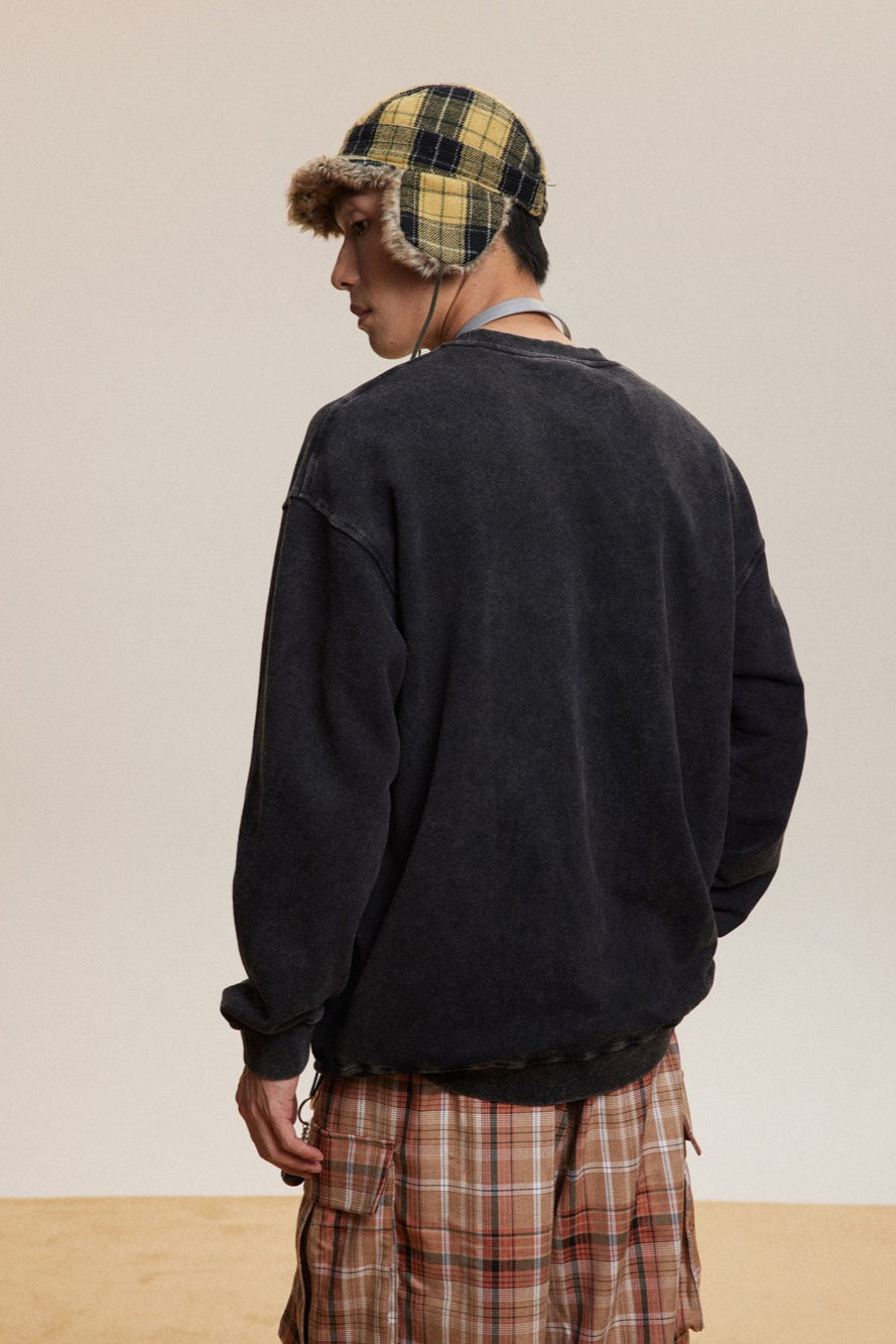 Sudadera holgada de cuello redondo