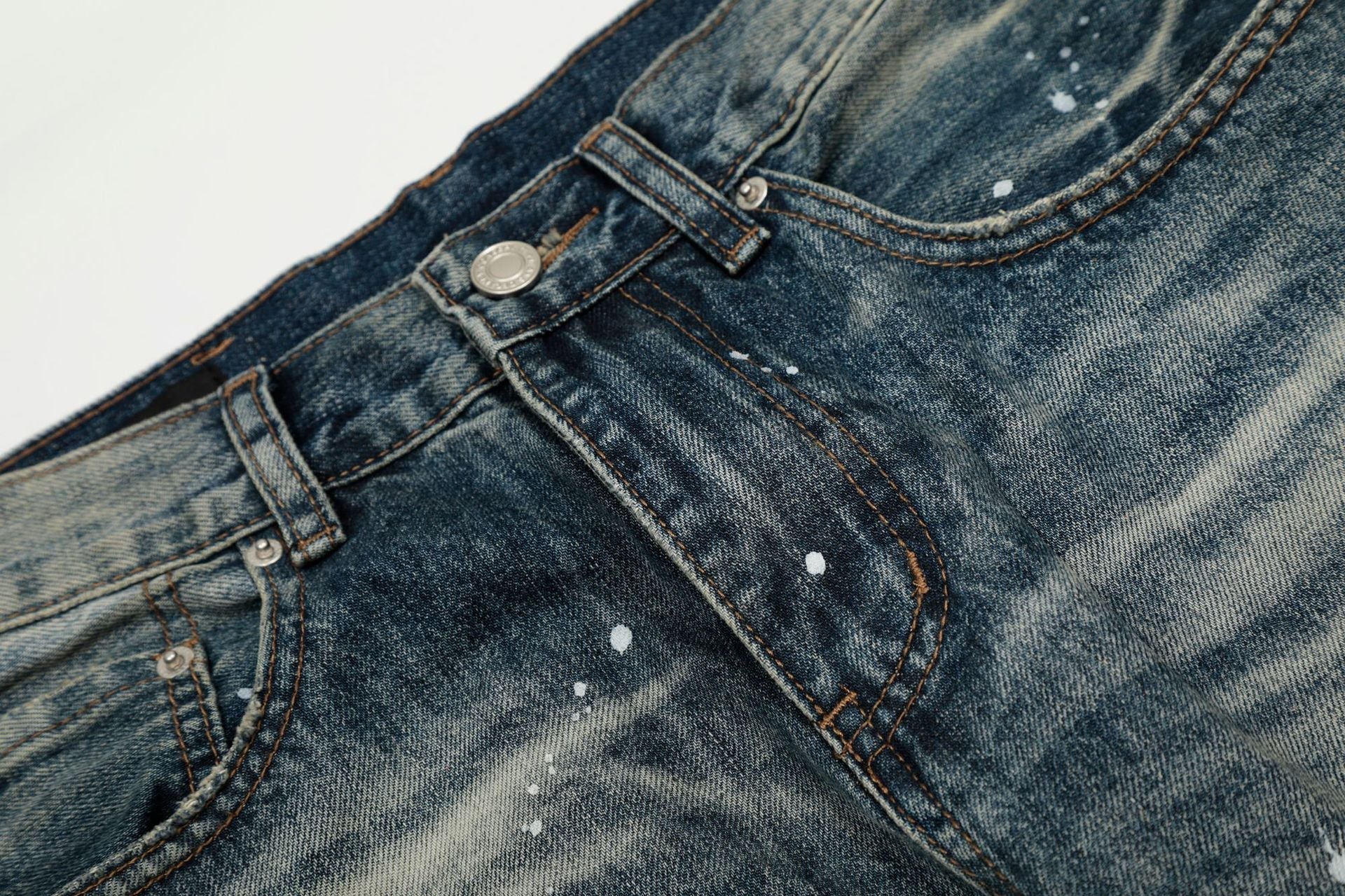 Washed Whisker Paint Splatter Curved Denim Jeans