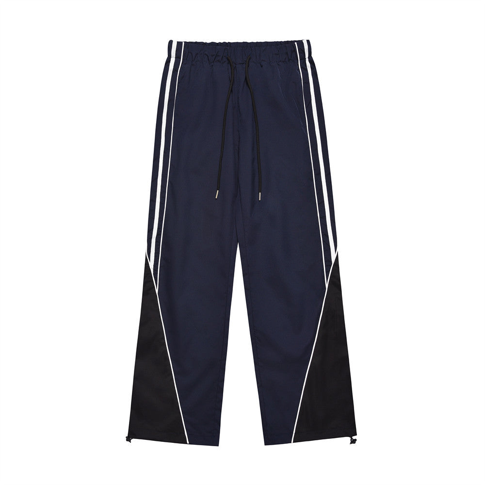 Pantalon patchwork à rayures latérales